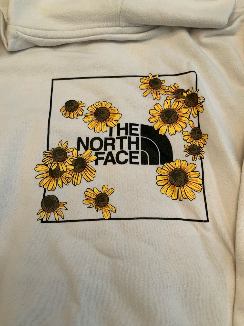 The North Face Cream Sweatshirt with Yellow Sunflower Graphic